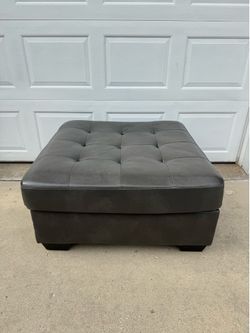 ASHLEY Oversized gray slate ottoman. Like New