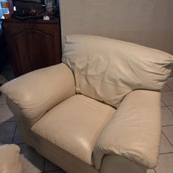 Pair Of Cream Leather Armchairs