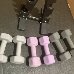 Cast Iron Neoprene Coat ...Set of Dumbbells with Rack; pairs of  12s, 15s and 17.5 lbs.