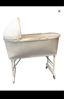 Antique wicker bassinet