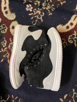 These are Nike Jordan KO 23 High Tops in a Smoke Gray and black colorway.