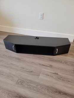 Black floating/wall-mounted tv stand