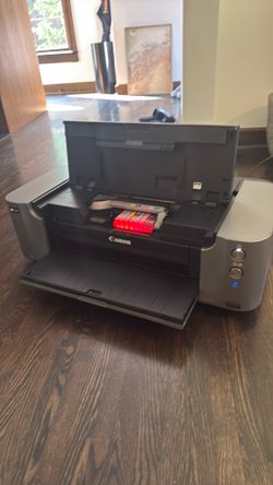 This is a Canon PIXMA PRO-100 professional photo inkjet printer.