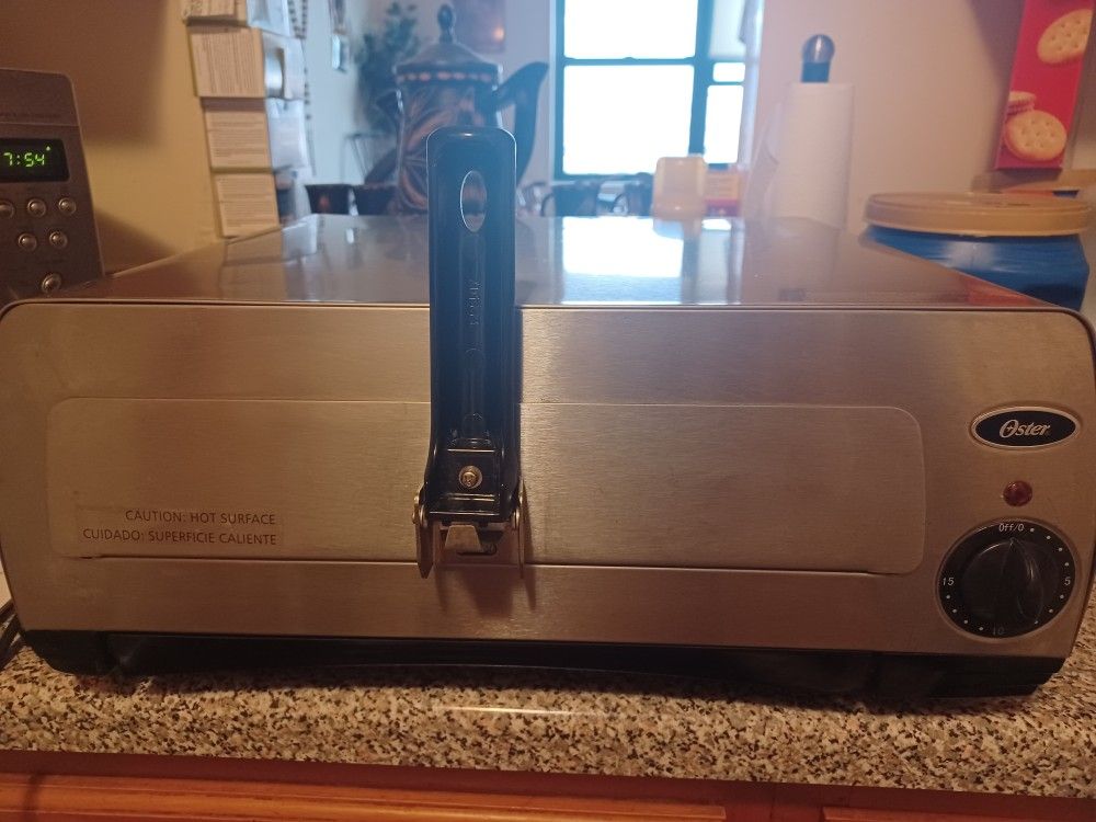 Oster STAINLESS STEEL Pizza Oven, 120v- 60Hz- 1450w,like New Only Pick Up