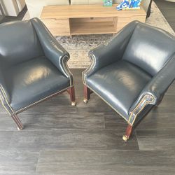 Pair Dark Blue Leather Armchairs w Brass Nailhead Trim & Casters