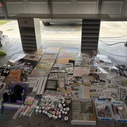 Craft Table With A Bunch Of Supplies 