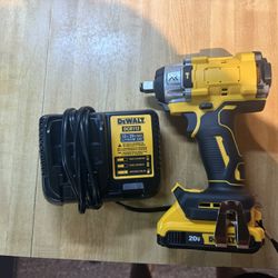 1/2” impact wrench with battery and charger $120 located in n Lakeland  