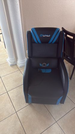 Reclining chair with massage remote