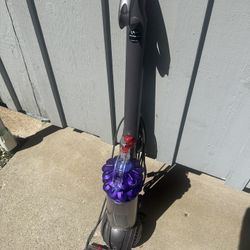 2 Dyson Vacuums