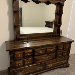 Eight drawer dresser with mirror in good solid condition. 