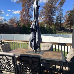 Used Patio Table With 6 Chairs and Umbrella Stand