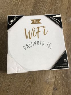 Oliver Gal WiFi password dry erase board