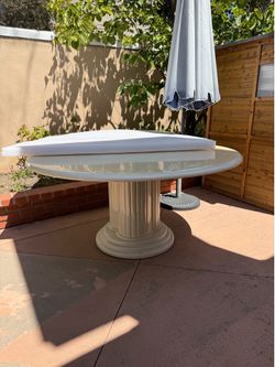 60” diameter round table and 28” lazy Susan