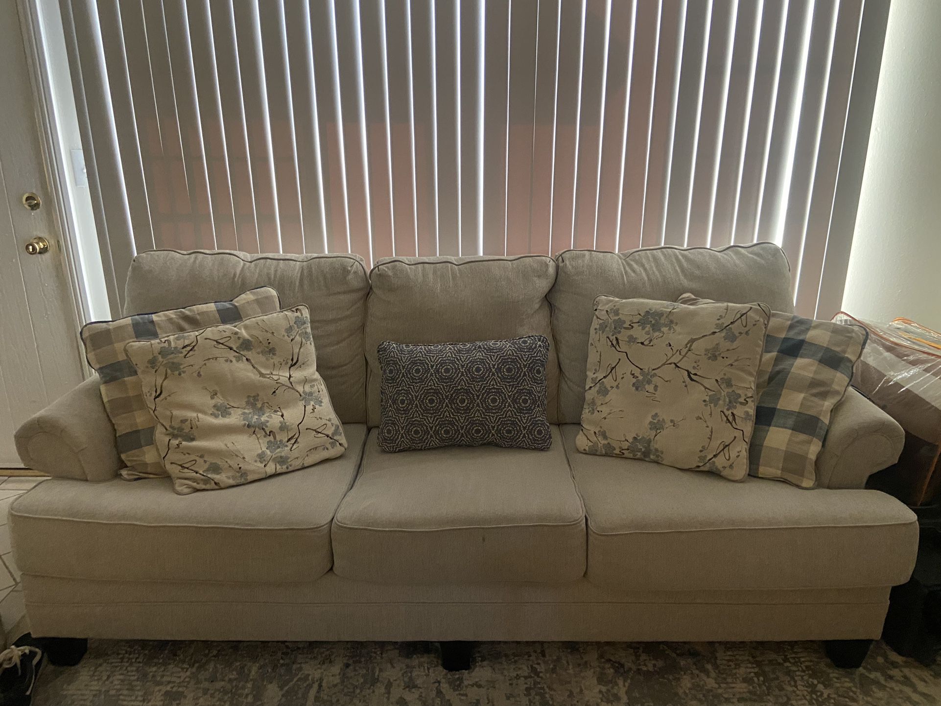 Beige Couch With Pillows 