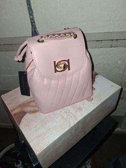 Brand New With Tag Bebe Hera small backpack purse in blush pink vegan leather. 