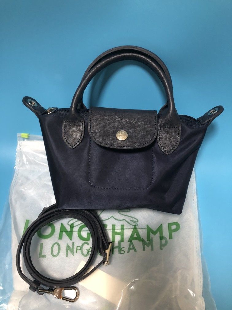 "LongChamp Le Pliage Neo Mini pouch with Shoulder Strap
"