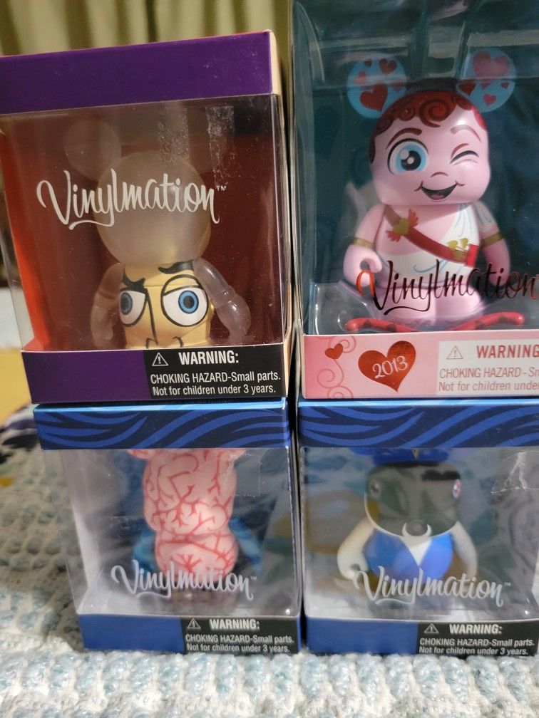 Disney Vinylmation Collectibles,  4 Different,  New , Price Change!!