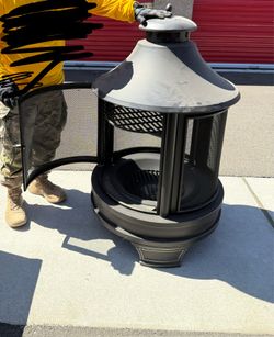 Outdoor wood fire pit/grill