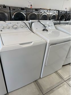 Ge top load washer and gas dryer set