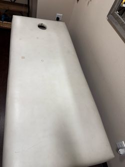 Massage table