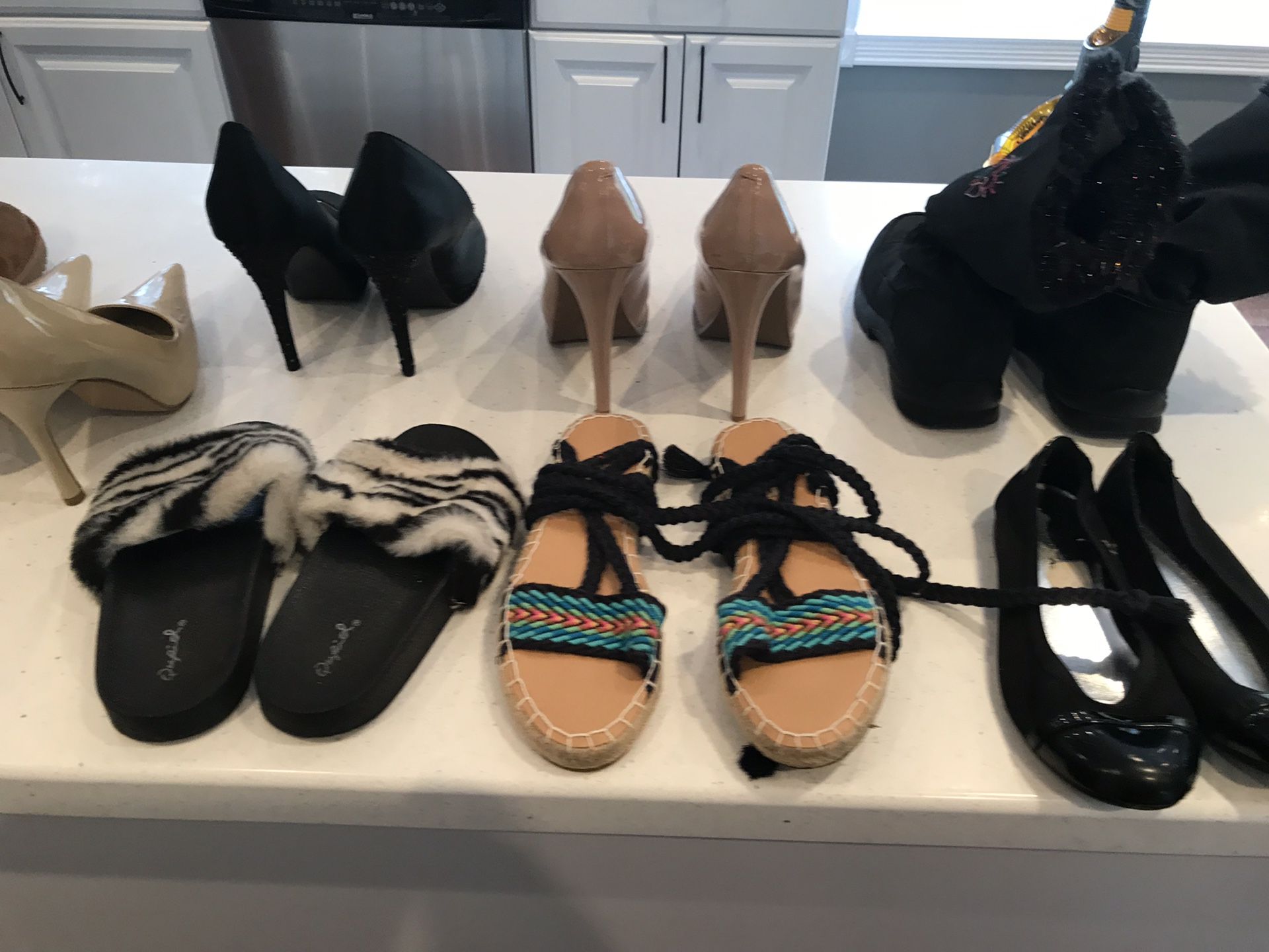 Heels and black boots , kids shoes