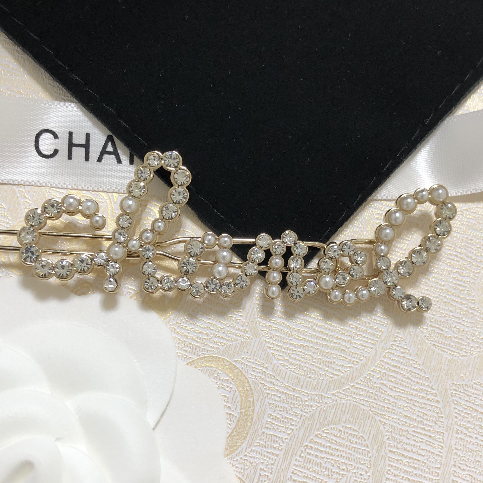 Open-box Chanel Pearls Hair Clip CC Logo Gold Letters Diamond Hairpin  Crystal Hairbind for Sale in Dundee, FL - OfferUp