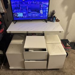 lift-top coffee table with hidden stools/ottomans