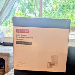 Brand New Delta 75270 Tesla Bathroom Sconce