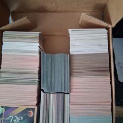 Mixed sports cards basketball baseball football