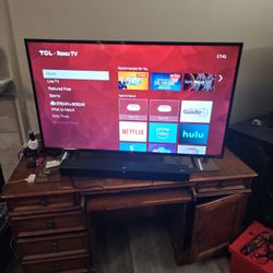 TLC 55" TV And Sound Bar 