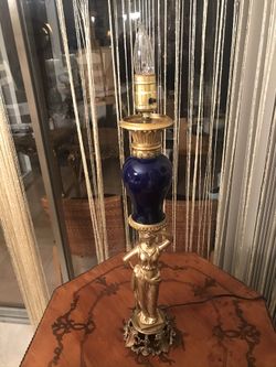 Antique lamp with blues porcelain and brass base
