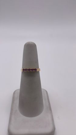 14k gold band ring with pink CZ