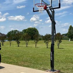 Goaliath 60 inch in ground basketball hoop, adjustable basketball court