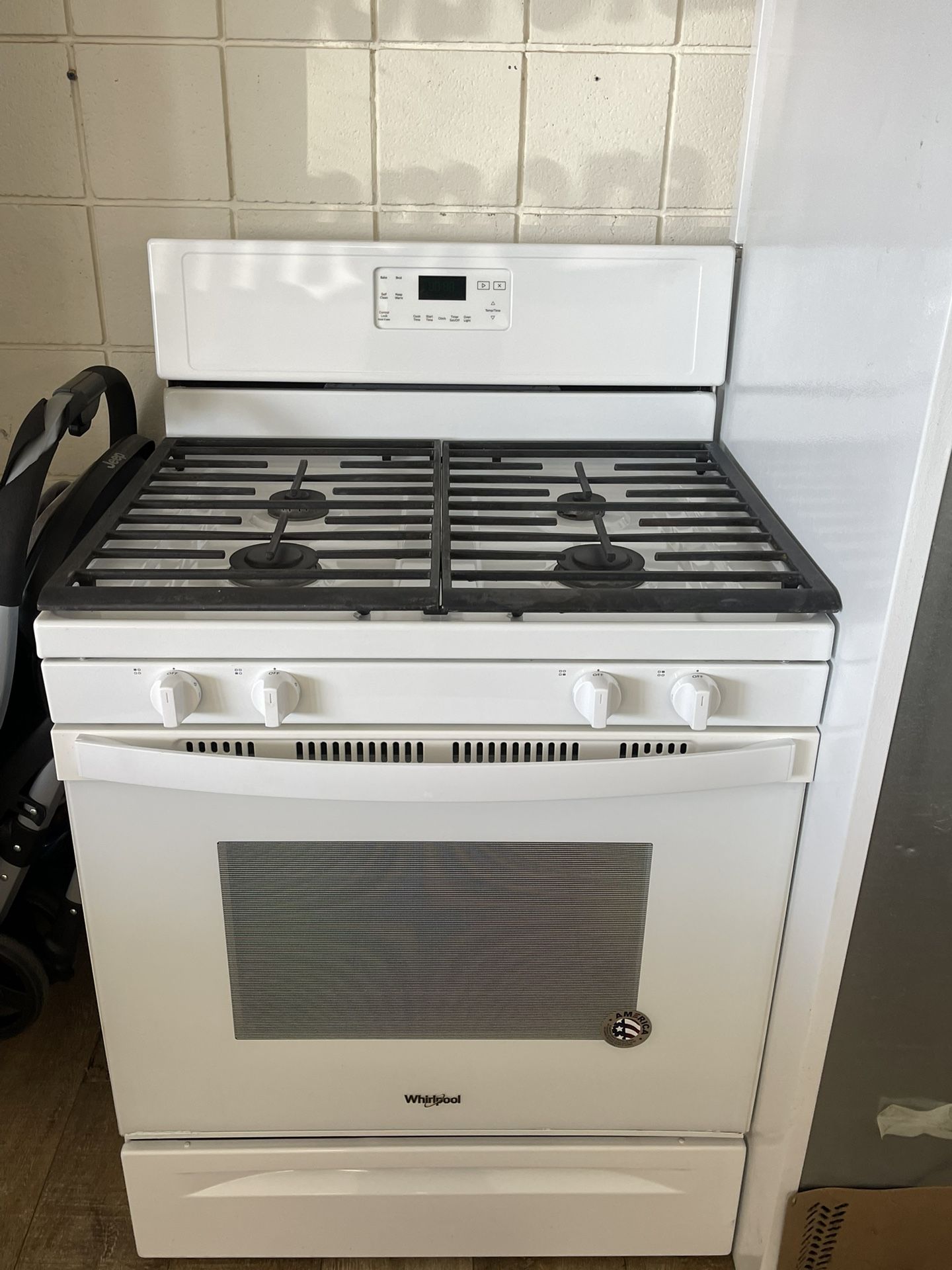 Whirlpool Natural Gas Four Burner Stove In Excellent Working Condition Like New