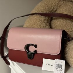 Ready For Pick Up Today: Pink and burgundy Coach crossbody bag