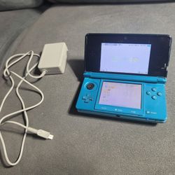 Nintendo 3DS aqua blue w/ rare power pak, game, and charger