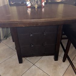 Wooden Dining Table With Wine Storage
