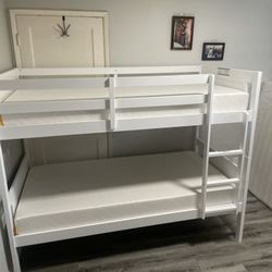 Twin over twin bunk bed. White or espresso. Assembly required. Assembly not included. Taxes included. Free delivery.  Bunk Bed only without Assembly-$