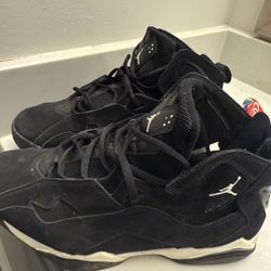 All black True Sliver Jordan’s 