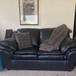 Two seater black couch