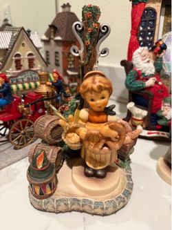 4‑Piece Goebel / Hummel Oktoberfest Collectible Bundle