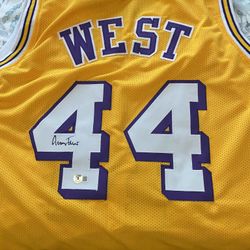 Autographed The Logo Jerry West Jersey. RIP