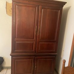 Wooden Armoire And TV