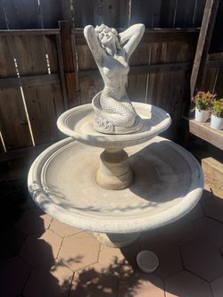 Concrete fountain- mermaid