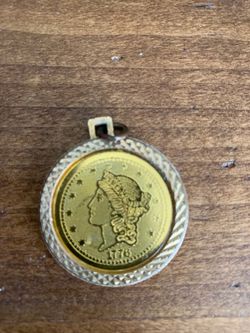 20$ gold plated medallion