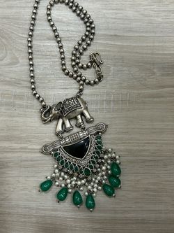 Silver-Tone Elephant Pendant Necklace with Green Stones