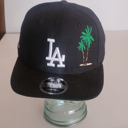 New Era 9Fifty Los Angeles Dodgers palm tree black 9FIFTY snapback hat 
New. Copperstown collection.   100% Polyester. Embroidered Logo with 
palm tre