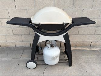 Asador Weber incluye tanque