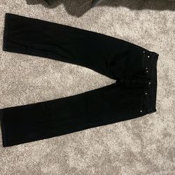 Levi’s Black 501’s.