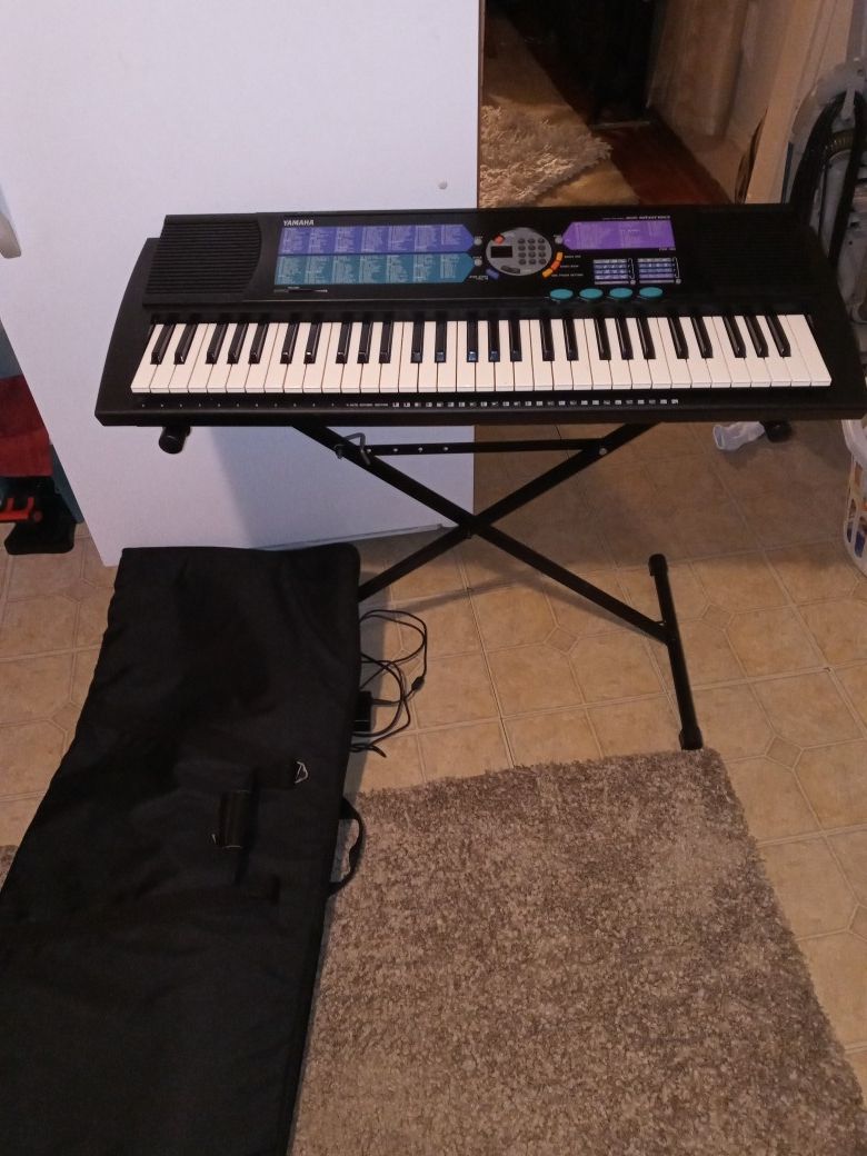 Yamaha Keyboard and bag and stand PSR-185